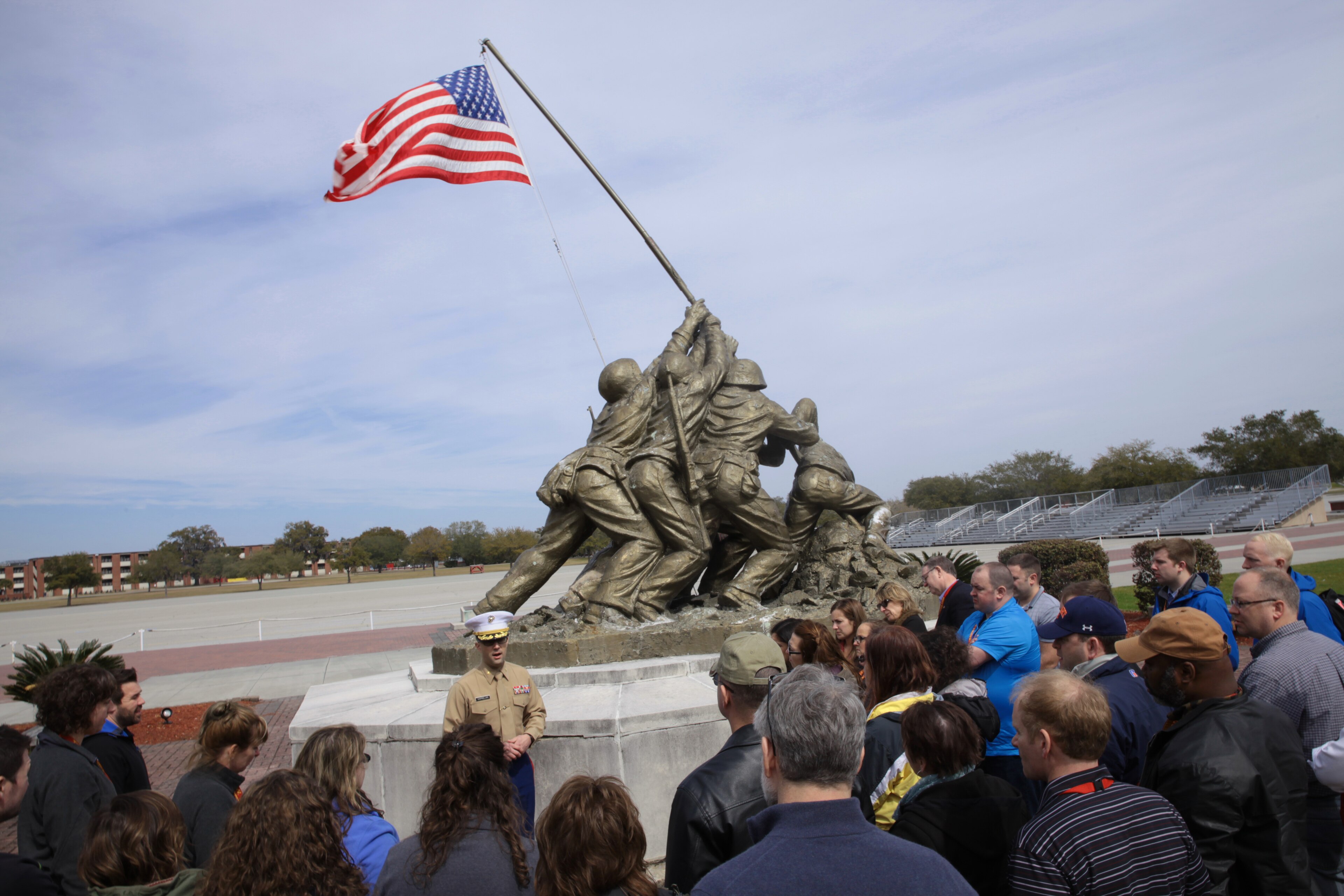 Educators gathered at the Iwo Jima Monument at Marine Corps Recruit Depot Parris Island, with the full American flag visible above the statue
